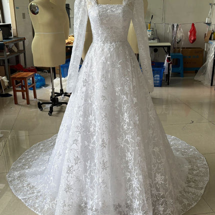 Embroidered Long Sleeve Trailing Wedding Dress